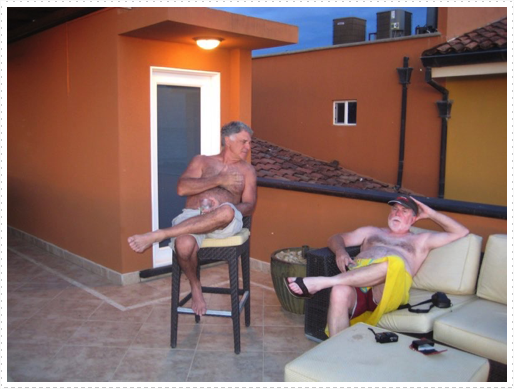 Cary Schwartz and Mike relaxing on roof of condo Cary Schwartz and Mike relaxing on roof of condo