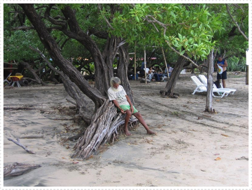 Local taking a nap on beach Local taking a nap on beach