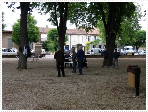 Locals playing bocce ball in park in Lectoure, France Locals playing bocce ball in park in Lectoure, France